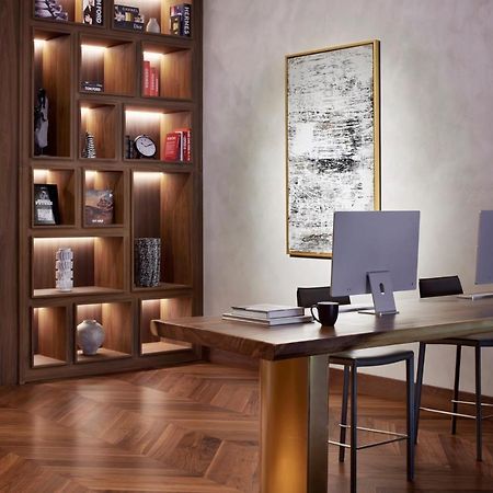 Movenpick Jumeirah Village Triangle Dubai Bagian luar foto The library at the hotel