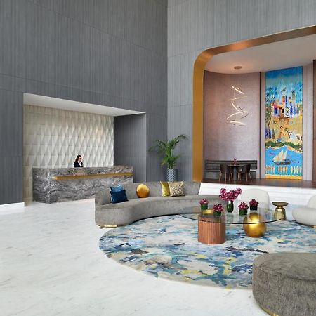 Movenpick Jumeirah Village Triangle Dubai Bagian luar foto The lobby of the hotel