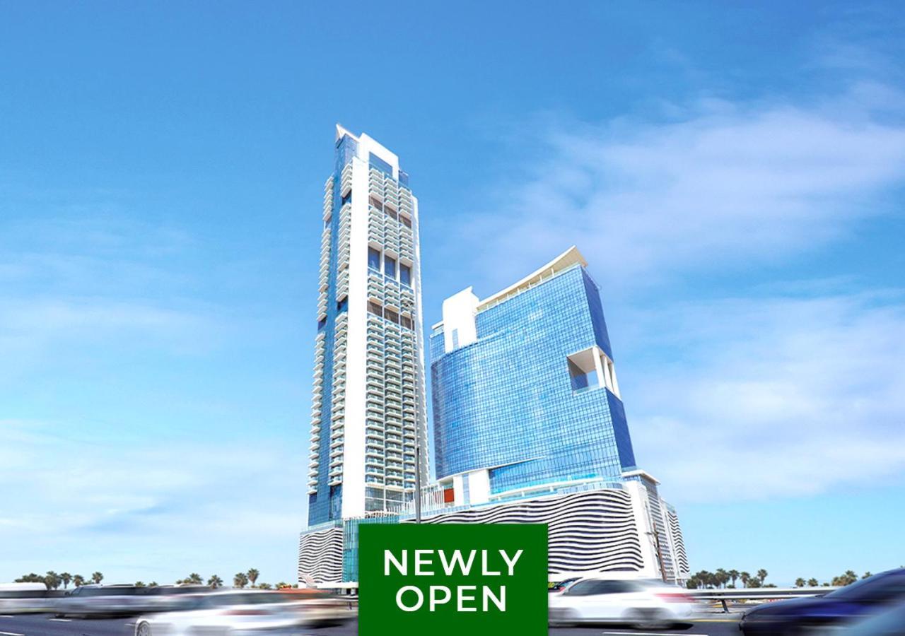 Movenpick Jumeirah Village Triangle Dubai Bagian luar foto The 101 Tower