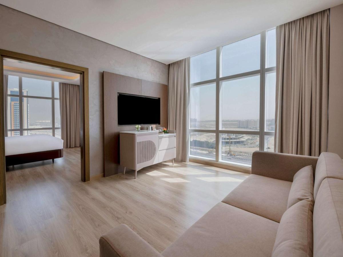 Movenpick Jumeirah Village Triangle Dubai Bagian luar foto Suite