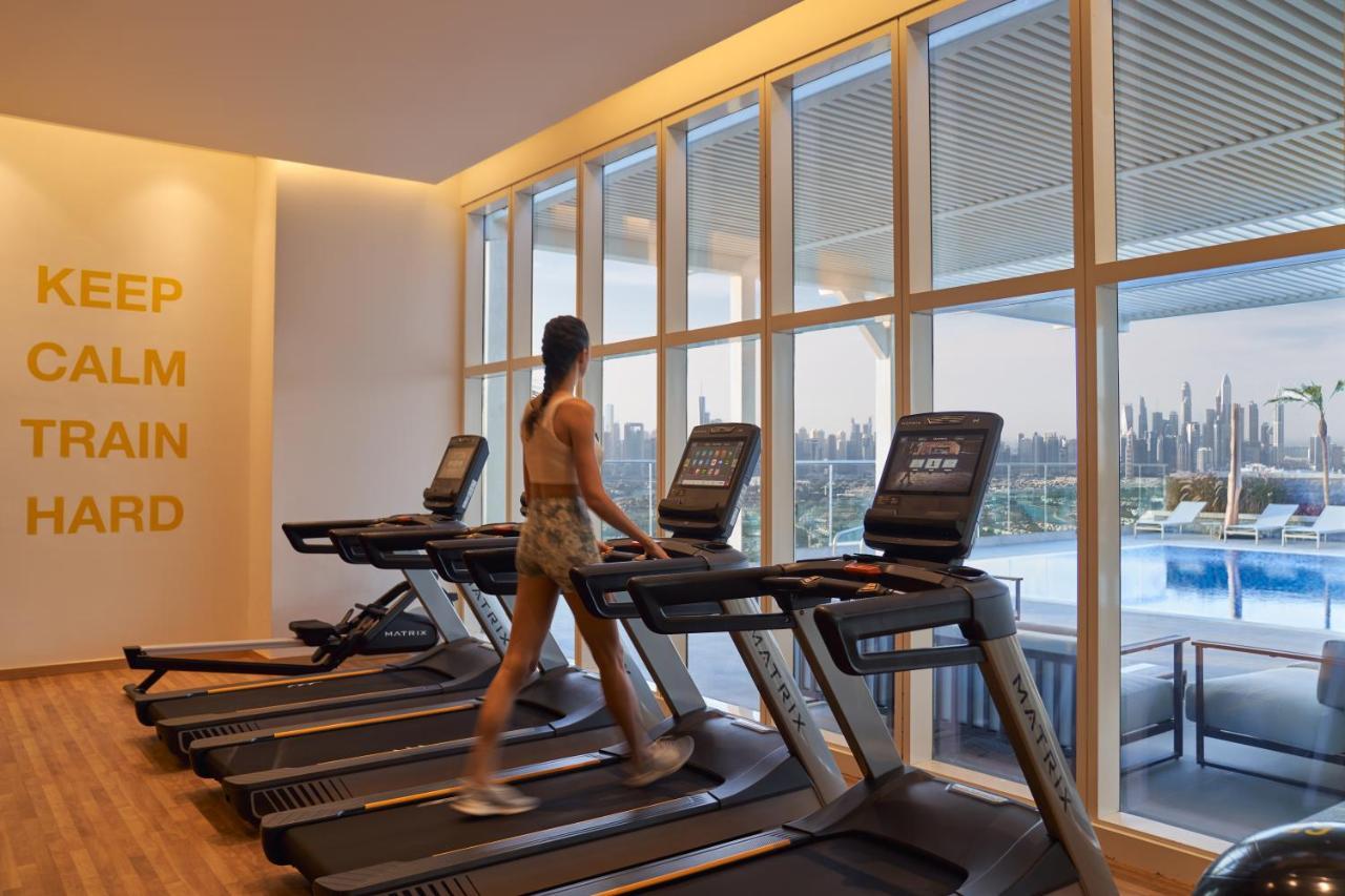 Movenpick Jumeirah Village Triangle Dubai Bagian luar foto The gym at the hotel