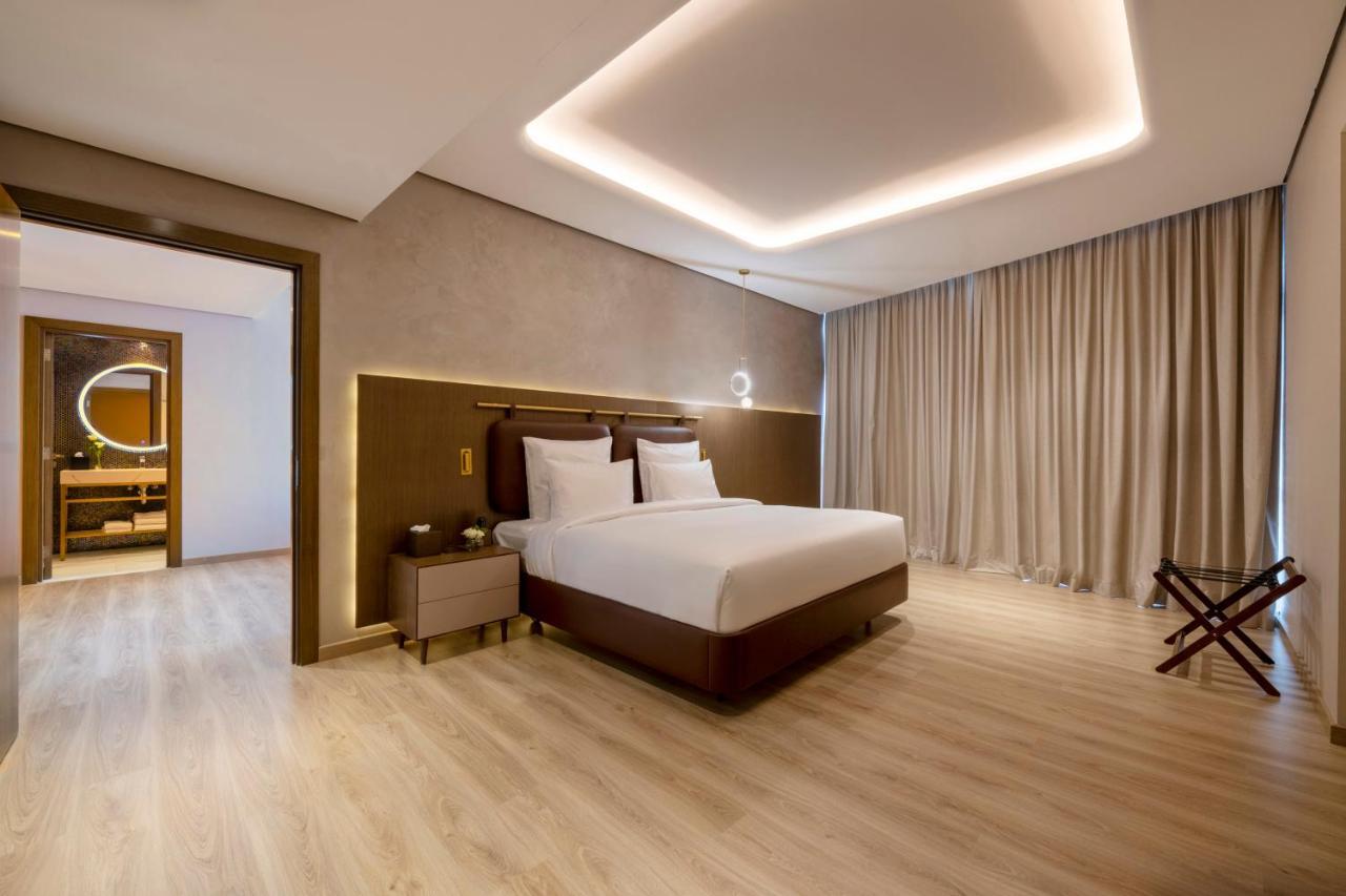 Movenpick Jumeirah Village Triangle Dubai Bagian luar foto Suite