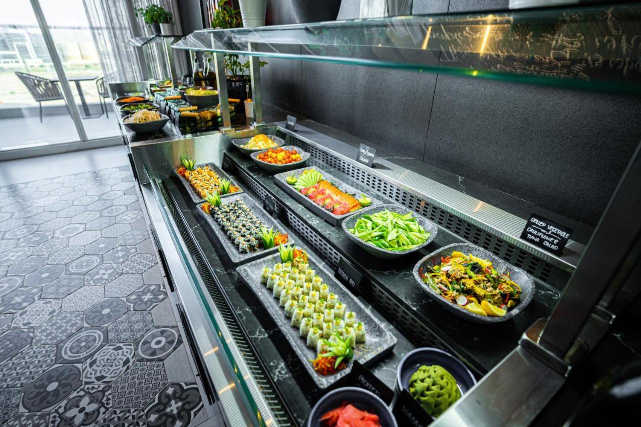 Movenpick Jumeirah Village Triangle Dubai Bagian luar foto A salad bar