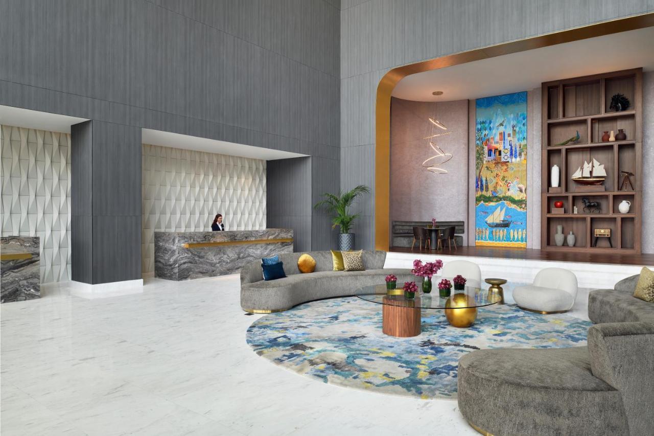 Movenpick Jumeirah Village Triangle Dubai Bagian luar foto The lobby of the hotel