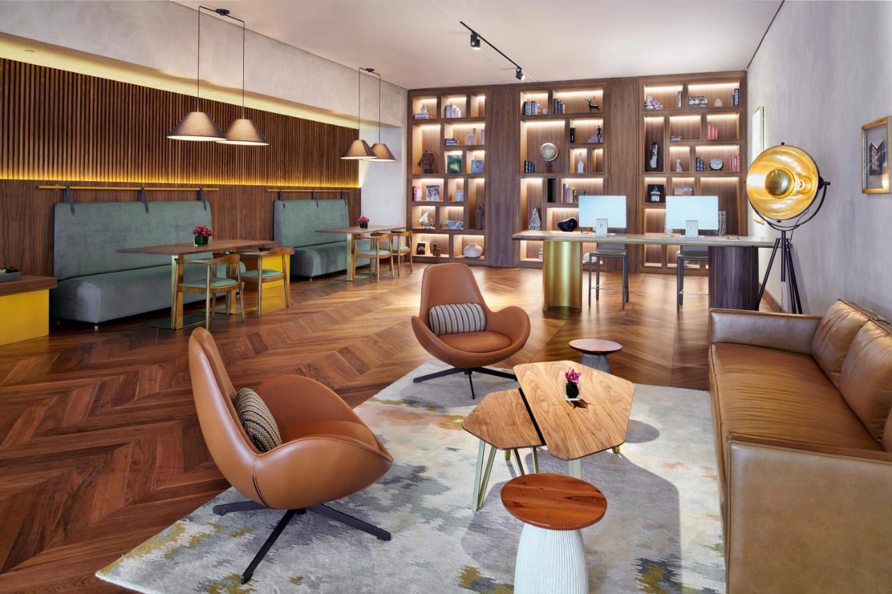 Movenpick Jumeirah Village Triangle Dubai Bagian luar foto The Library at The Hari