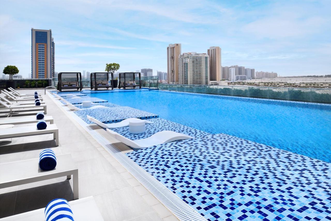 Movenpick Jumeirah Village Triangle Dubai Bagian luar foto Rooftop pool